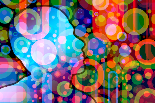 What Is an Empath? Are You or Any of Your Friends Empaths? an outline of a human face filled with and surrounded with various colors