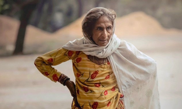 Be Bold in the Moments That Matter an older woman standing outside with a very determined expression