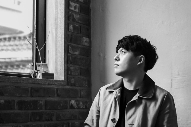 Beyond Addiction: The Twelve Steps of Shamanic Recovery A young man sitting at a table and staring out the window. Image by JUNO KWON from Pixabay.